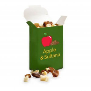 A small green box containing dried apple and sultanas