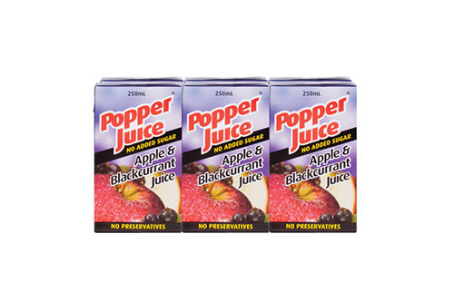 Image of the front of three Apple and Blackcurrant Juice Poppers close up in a row.