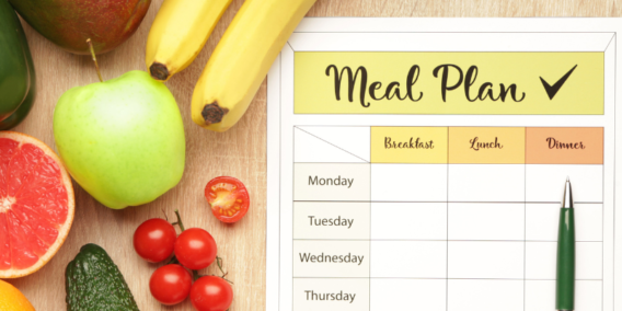 mid week meal planner calendar with a selection of fruit and vegetables